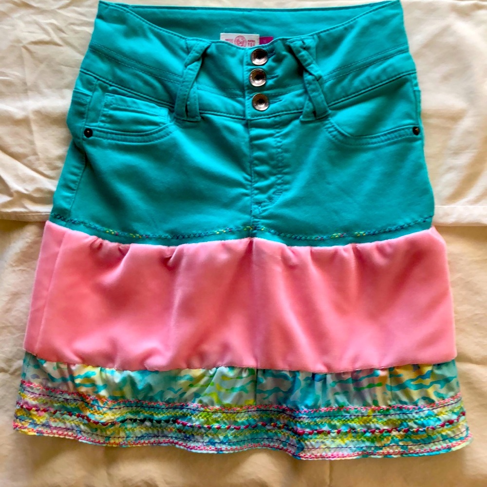 This custom made skirt is 16” long and 24” waist.